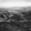 Creag Coire na Feola and Coire Mhoraigein, Strathconon Forest.  Oblique aerial photograph taken facing south-east.