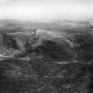 Creag Coire na Feola and Coire Mhoraigein, Strathconon Forest.  Oblique aerial photograph taken facing south-east.