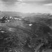 An Gorm-loch and Carn an Alltain Riabhaich, Strathconon Forest.  Oblique aerial photograph taken facing west.