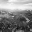 Loch na Caoidhe and An Gorm-loch, Strathconon Forest.  Oblique aerial photograph taken facing west.