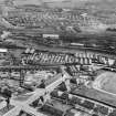 Coatbridge, general view, showing Stewarts and Lloyds Ltd. Works, Main Street and Calder Station.  Oblique aerial photograph taken facing south.