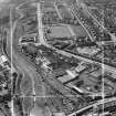 Stewarts and Lloyds Ltd. Works, Main Street and Albion Rovers Football Ground, Coatbridge.  Oblique aerial photograph taken facing west.  This image has been produced from a crop marked negative.