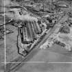 Stewarts and Lloyds Ltd. Works, Waverley Street, Coatbridge.  Oblique aerial photograph taken facing south-east.  This image has been produced from a crop marked negative.