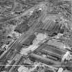 Coatbridge, general view, showing Stewarts and Lloyds Ltd. Calder Tube Works and Stewarts and Lloyds Ltd. Works, Main Street.  Oblique aerial photograph taken facing east.  This image has been produced from a crop marked negative.