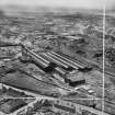 Coatbridge, general view, showing Stewarts and Lloyds Ltd. Calder Tube Works and Victoria Iron and Steel Works.  Oblique aerial photograph taken facing north-west.  This image has been produced from a crop marked negative.