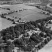 Invergowrie House and Farmstead, Ninewells, Dundee.  Oblique aerial photograph taken facing north-east.  This image has been produced from a crop marked negative.