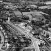 Barrhead, general view, showing West Arthurlie Bleach Works, Kelburn Street.  Oblique aerial photograph taken facing west.  This image has been produced from a crop marked negative.