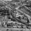 Barrhead, general view, showing West Arthurlie Bleach Works, Kelburn Street and Main Street.  Oblique aerial photograph taken facing north-east.  This image has been produced from a crop marked negative.