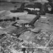 Gordon Schools, Castle Road and Huntly Castle, Huntly.  Oblique aerial photograph taken facing north.  This image has been produced from a crop marked negative.