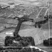 Huntly, general view, showing Huntly Castle and Gordon Schools, Castle Road.  Oblique aerial photograph taken facing south.  This image has been produced from a crop marked negative.