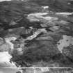 Kiloran, general view, showing Colonsay House, Kiloran and Beinn an Sgoltaire.  Oblique aerial photograph taken facing south.  This image has been produced from a crop marked negative.