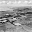 Caulkerbush, general view, showing Redbank Farm and Mersehead Sands.  Oblique aerial photograph taken facing west.