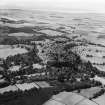 Caulkerbush, general view, showing Southwick House and Home Farm.  Oblique aerial photograph taken facing east.  This image has been produced from a damaged negative.