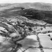Caulkerbush, general view, showing Southwick House and Doon Hill.  Oblique aerial photograph taken facing north-east.  This image has been produced from a damaged negative.