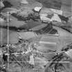 Denny, general view, showing Denovan Mains and Broad Street.  Oblique aerial photograph taken facing north.  This image has been produced from a crop marked negative.
