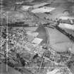 Denny, general view, showing Broad Street and Glasgow Road.  Oblique aerial photograph taken facing north.  This image has been produced from a crop marked negative.