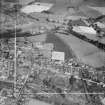 Denny, general view, showing Broad Street and Glasgow Road.  Oblique aerial photograph taken facing north.  This image has been produced from a crop marked negative.