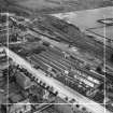 Wilkie and Paul Ltd. Grove Works and railway sidings, Slateford Road, Edinburgh.  Oblique aerial photograph taken facing east.  This image has been produced from a crop marked negative.