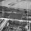 Wilkie and Paul Ltd. Grove Works, Slateford Road and Meggetland Playing Fields, Edinburgh.  Oblique aerial photograph taken facing east.  This image has been produced from a crop marked negative.