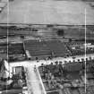 Wilkie and Paul Ltd. Grove Works, Slateford Road and Meggetland Playing Fields, Edinburgh.  Oblique aerial photograph taken facing south-east.  This image has been produced from a crop marked negative.