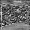 Bonnybridge Gasworks and Smith and Wellstood Ltd. Columbian Stove Works, Bonnybridge.  Oblique aerial photograph taken facing south.  This image has been produced from a crop marked negative.