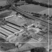 M and C Switchgear Ltd. Kelvinside Works, Kirkintilloch.  Oblique aerial photograph taken facing north-east.  This image has been produced from a crop-marked negative.