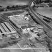 M and C Switchgear Ltd. Kelvinside Works, Kirkintilloch.  Oblique aerial photograph taken facing north.  This image has been produced from a crop marked negative.