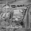 M and C Switchgear Ltd. Kelvinside Works, Kirkintilloch.  Oblique aerial photograph taken facing north.  This image has been produced from a crop marked negative.