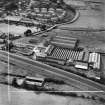 M and C Switchgear Ltd. Kelvinside Works, Kirkintilloch.  Oblique aerial photograph taken facing south-west.  This image has been produced from a crop marked negative.