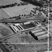 M and C Switchgear Ltd. Kelvinside Works, Kirkintilloch.  Oblique aerial photograph taken facing east.  This image has been produced from a crop marked negative.