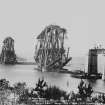 View of the bridge under construction.
Insc. 'The Forth Bridge. Length including Viaduct 8098 Ft. Height 369 Ft. Spans 1710 Ft each. (23rd June 1888)  616.'