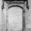 Detail of door with inscribed lintel.
