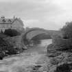 General view of bridges and Carrbridge Hotel with the old bridge in the foreground
A Brown & Co Lanark