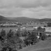 Distant view of Kingussie town and bridge
