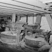 General interior view, looking SW at millstones