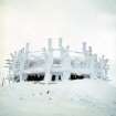 Photographic image of the Ptarmigan Restaurant under construction and covered with snow.