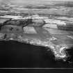 Boddin Point and Mains of Dunninald, Montrose.  Oblique aerial photograph taken facing north.  This image has been produced from a crop marked negative.