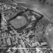 Edinburgh, general view, showing St Leonard's Hall, Holyrood Park Road and Salisbury Green, Dalkeith Road.  Oblique aerial photograph taken facing north.  This image has been produced from a crop marked negative.