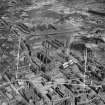 Glasgow, general view, showing Royal Infirmary and Glasgow Cathedral.  Oblique aerial photograph taken facing north-east.  This image has been produced from a crop marked negative.