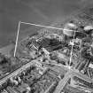 Alloa Glass Works, Glasshouse Loan, Alloa.  Oblique aerial photograph taken facing west.  This image has been produced from a crop marked negative.
