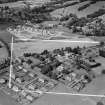 Moffat, general view, showing Warriston School Holmpark, Ballplay Road and Park Circle.  Oblique aerial photograph taken facing north-west.  This image has been produced from a crop marked negative.