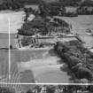 Newbyth Farmhouse and Walled Garden, Whitekirk.  Oblique aerial photograph taken facing south.  This image has been produced from a crop marked negative.