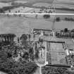 Newbyth Mains and Walled Garden, Whitekirk.  Oblique aerial photograph taken facing west.  This image has been produced from a crop marked negative.