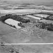 Newbyth Farm, Whitekirk.  Oblique aerial photograph taken facing north.  This image has been produced from a crop marked negative.