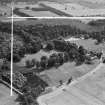 Newbyth Farm and Stables, Whitekirk.  Oblique aerial photograph taken facing south.  This image has been produced from a crop marked negative.
