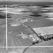 Fenton Barns, Drem, general view.  Oblique aerial photograph taken facing north-east.  This image has been produced from a crop marked negative.