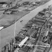Glasgow, general view, showing Mechans Ltd. Scotstoun Ironworks, South Street and Harland and Wolff Diesel Engine Works, Balmoral Street.  Oblique aerial photograph taken facing west.  This image has been produced from a crop marked negative.
