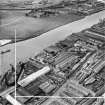 Mechans Ltd. Scotstoun Ironworks, South Street and Harland and Wolff Diesel Engine Works, Balmoral Street, Glasgow.  Oblique aerial photograph taken facing west.  This image has been produced from a crop marked negative.