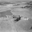 Cruivie Castle and Farm, Logie.  Oblique aerial photograph taken facing south-east.