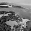 Donibristle House and Dalgety Bay.  Oblique aerial photograph taken facing east.